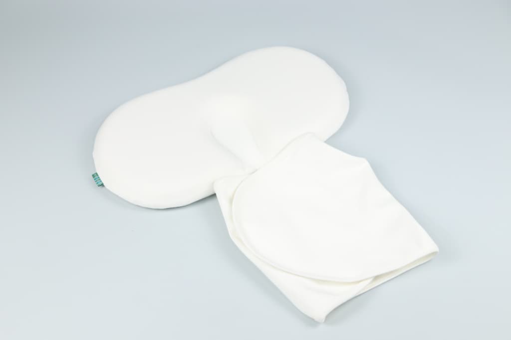 Integrated Swaddle And Pillow