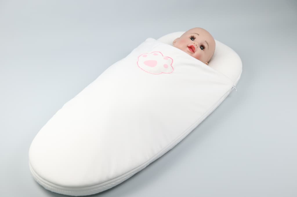 4-in-1 Anti-Startle Newborn Carry Pad